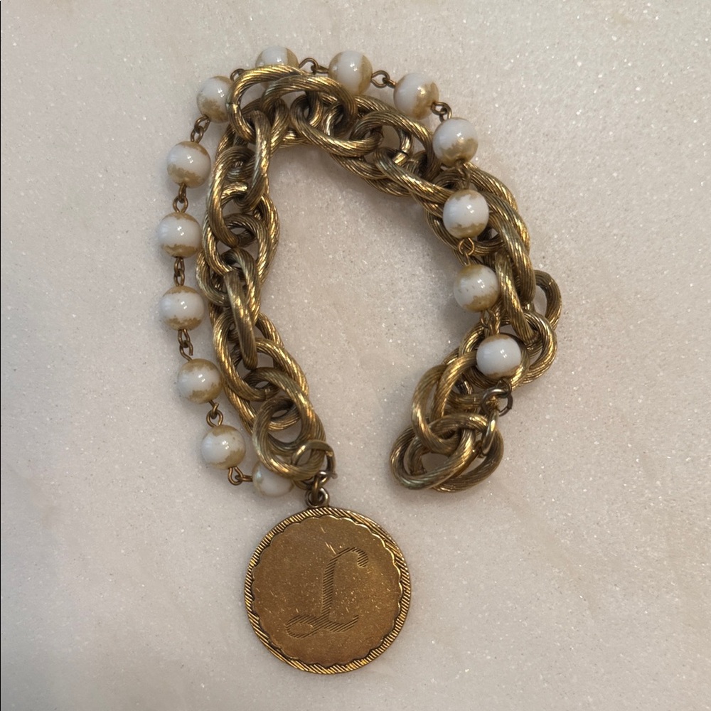 Anthropology “L” charm Elegant Gold and Cream Chain Bracelet
